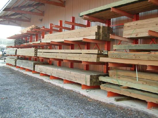 Treated lumber posts for post-frame buildings