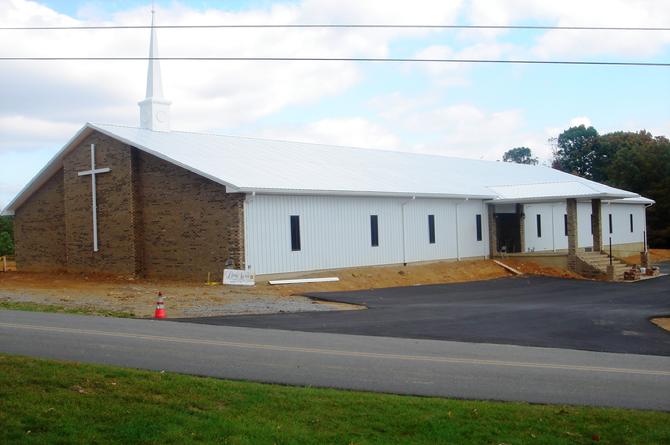 White Construction Post-frame building - alternative siding