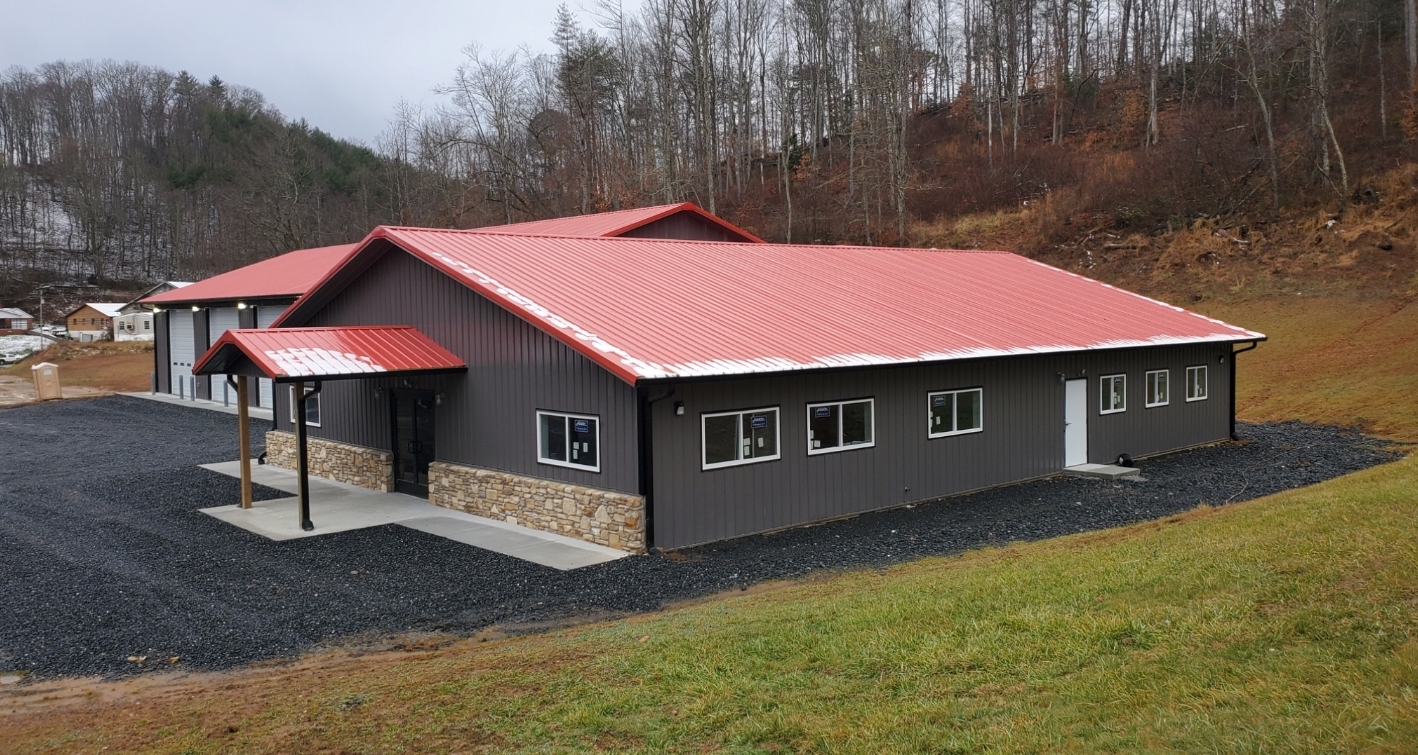 fire department post frame building - white construction - 1