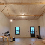 White Construction - post frame home finishing - rustic ceiling